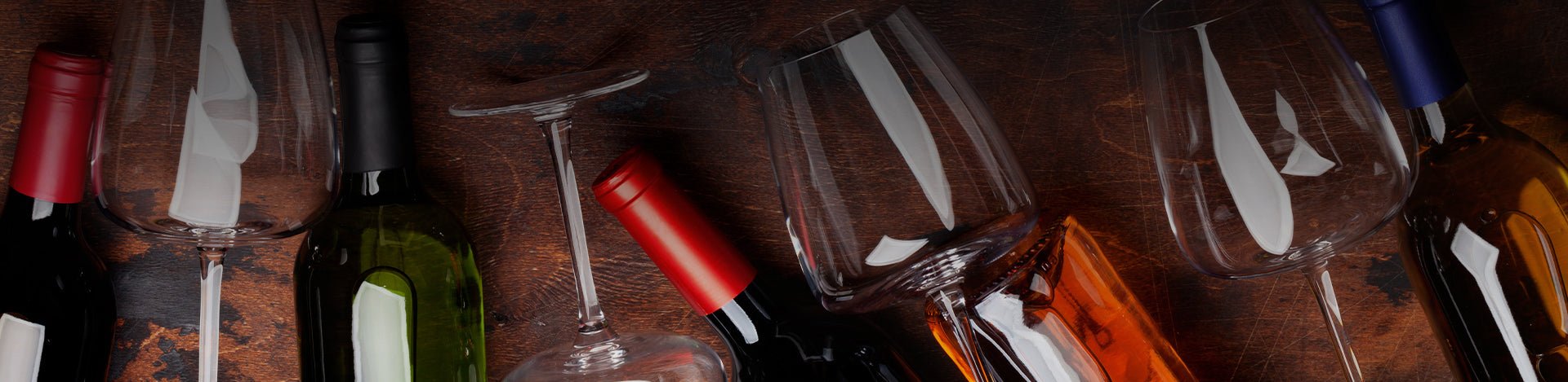 Bottles of wine and glasses. Recommended wines collection