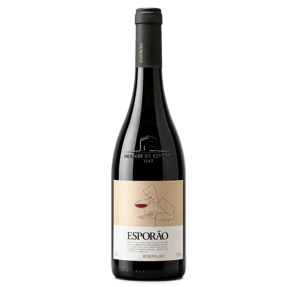 A bottle of Herdade de Esporão red wine, featuring a dark glass bottle with a beige and white label and a black capsule, set against a plain white background.