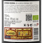 The back of a bottle of Esporão Reserva DOC Alentejo Portuguese red wine, showing product details, ingredients, a QR code, and a colorful vintage-style label illustration.