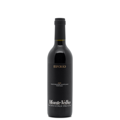 Monte Velho wine bottle with a ruby color, featuring aromas of red and wild berries, perfect for wine lovers.