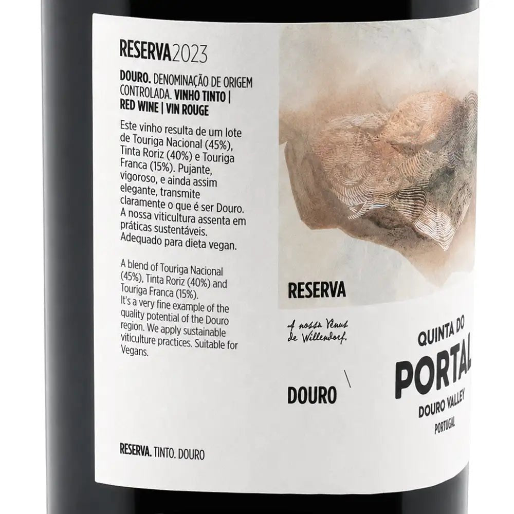 Close-up of a wine bottle label reading 'RESERVA 2023' and 'DOURO, DENOMINAÇÃO DE ORIGEM CONTROLADA .