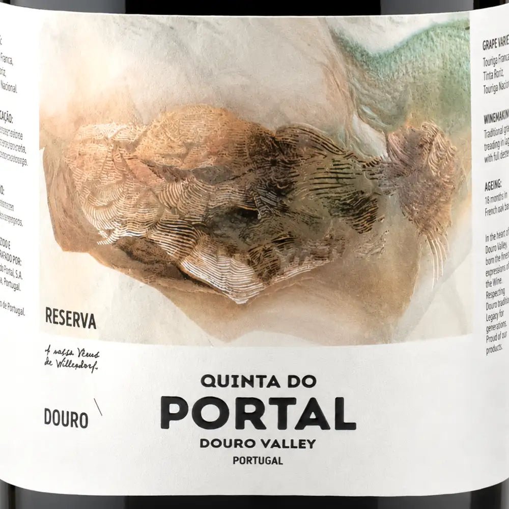 Close-up of a wine label reading 'QUINTA DO PORTAL', 'DOURO VALLEY', and 'PORTUGAL', with a large abstract brown and beige illustration on a white label background.