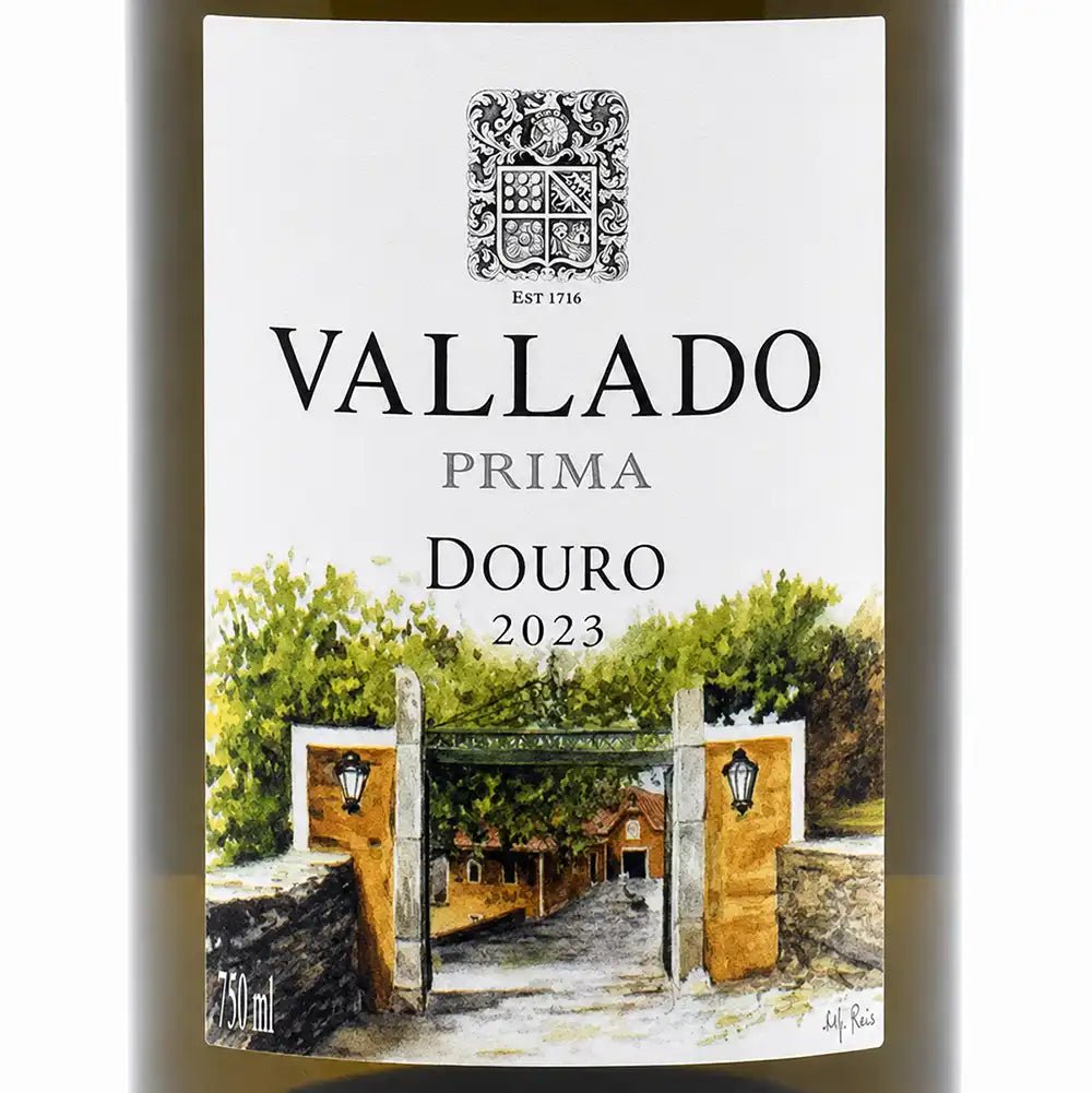 Vallado Prima Douro 2023 wine bottle label, featuring a white background with a black and white crest, elegant black and gray typography, and a watercolor illustration of a stone gate with green trees and yellow-orange buildings.