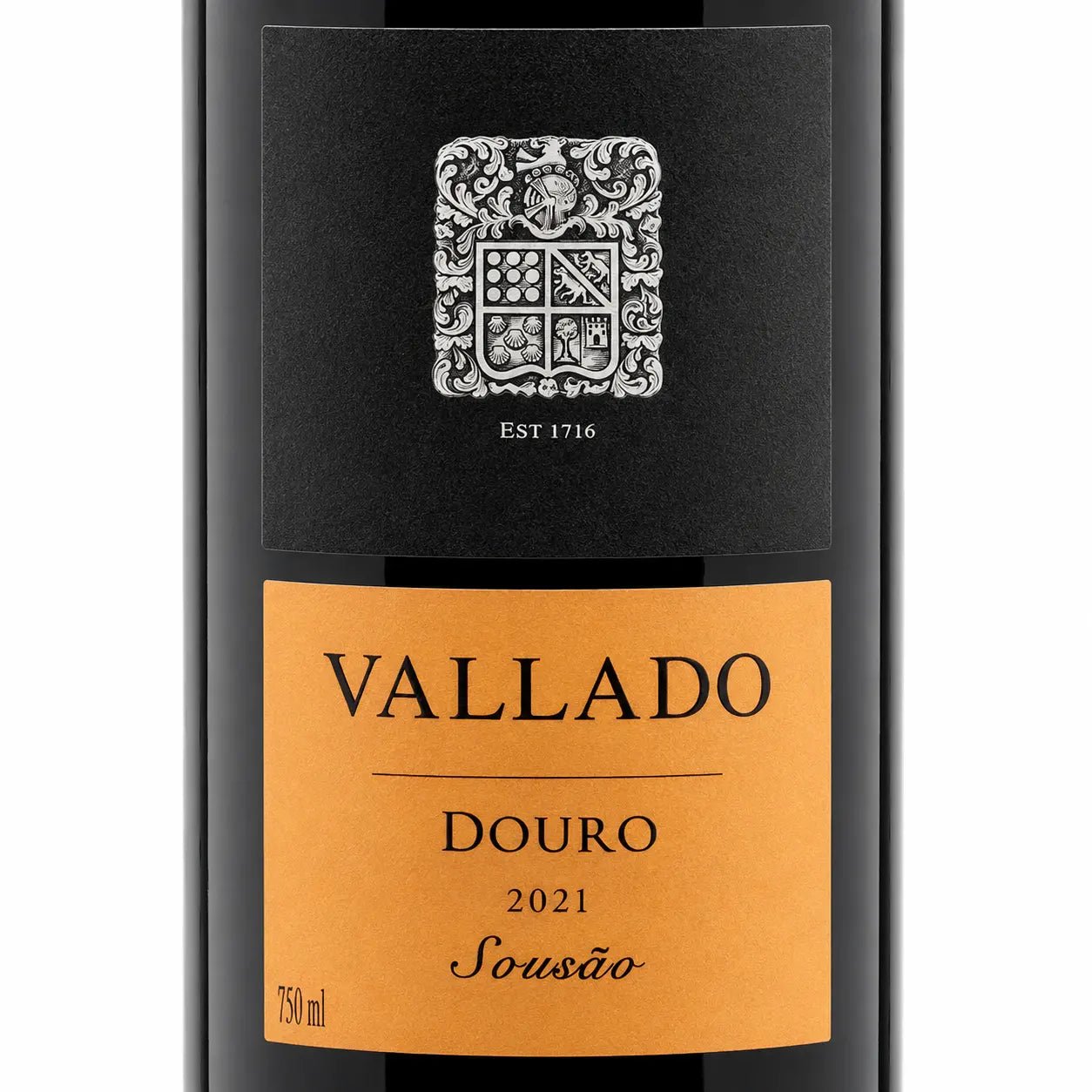 Front view of a Vallado Sousão Douro 2021 Sousão wine bottle, showing a black label with a silver crest and a warm orange label below.