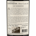 The back of a Quinta da Romanaire Dona Clara 2021 IGP Duriense wine bottle, showing the detailed Portuguese and English label text, barcode, and producer details.