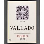 Front-facing wine bottle label for Vallado Douro 2022, showing a cream label with a dark crest, large black VALLADO text, red DOURO text, and 750 ml at the bottom left.