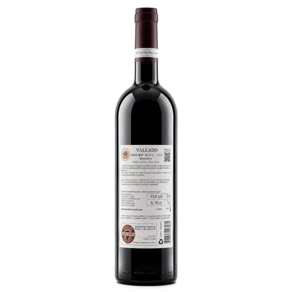 A bottle of Vallado Reserva red wine with a dark glass body, dark red wax seal, and a white label showing product details, set against a plain white background.