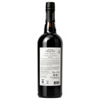 A bottle of Quinta do Crasto Porto Ruby Reserva Port  wine, showing the back of the dark glass bottle with its white label and black capsule, on a plain white background.