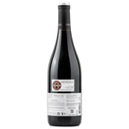 Crasto-superior-bottle. The back of a dark glass wine bottle with a black capsule and a white label, photographed against a plain white background.