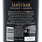 The back label of a Sandeman Founder's Reserve Ruby Porto wine bottle, showing product details, ingredients, and a barcode on a black background.
