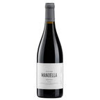 A bottle of Manoella Douro red wine with a white label and gray foil, photographed against a solid white background.