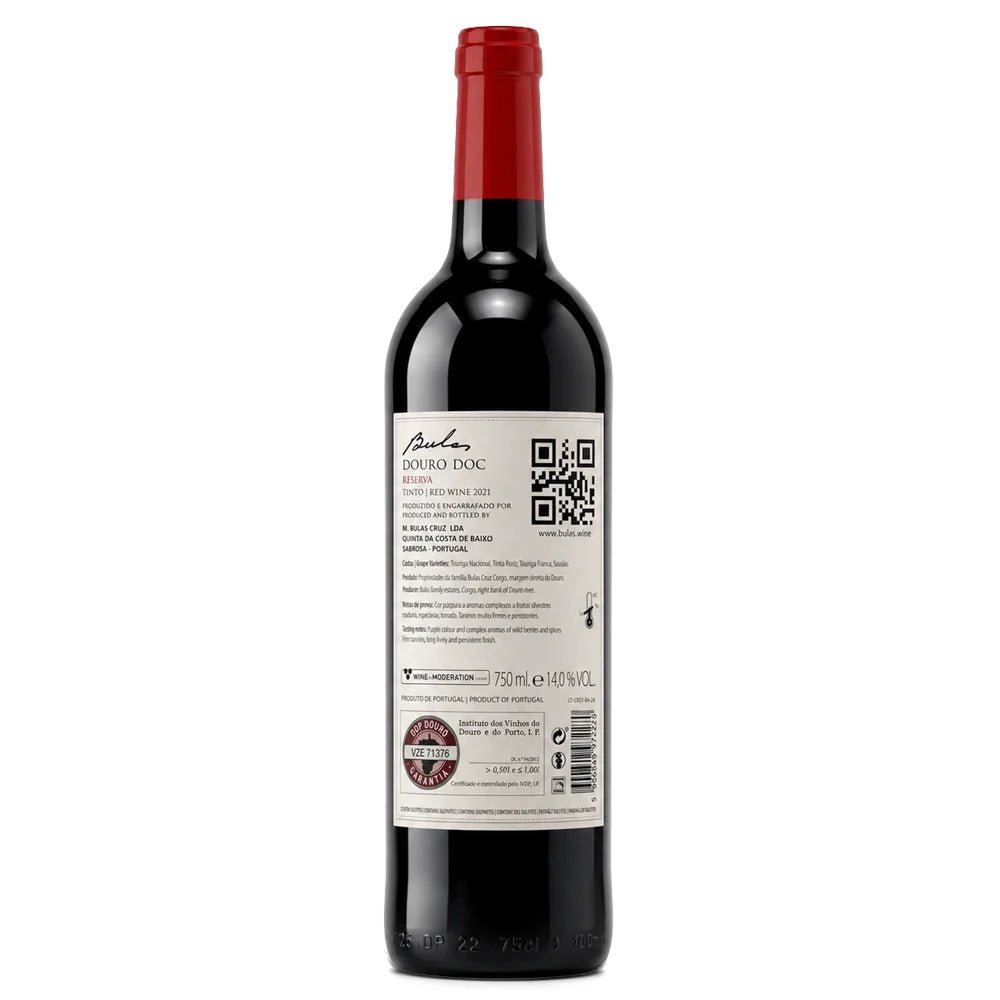 A bottle of Bulas Reserva red wine from the brand Barolo, showing the back label and red foil cap against a plain white background.