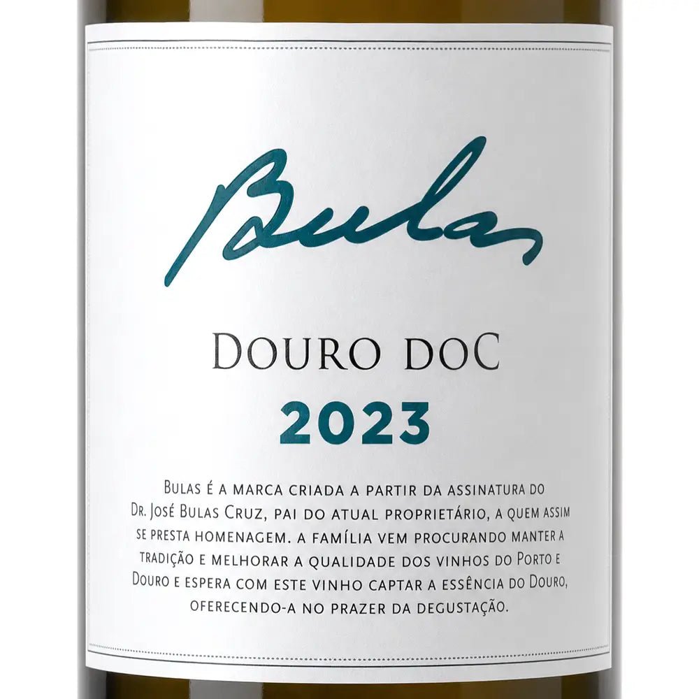 Close-up of a wine bottle label reading 'Bullas' and 'Douro Doc 2023' on a white label with dark green text and wine-colored bottle edges visible at the top and bottom.