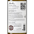 The back of a white wine bottle label for Bulas Douro Doc Branco, showing text details, a QR code, and certification logos on a white background.
