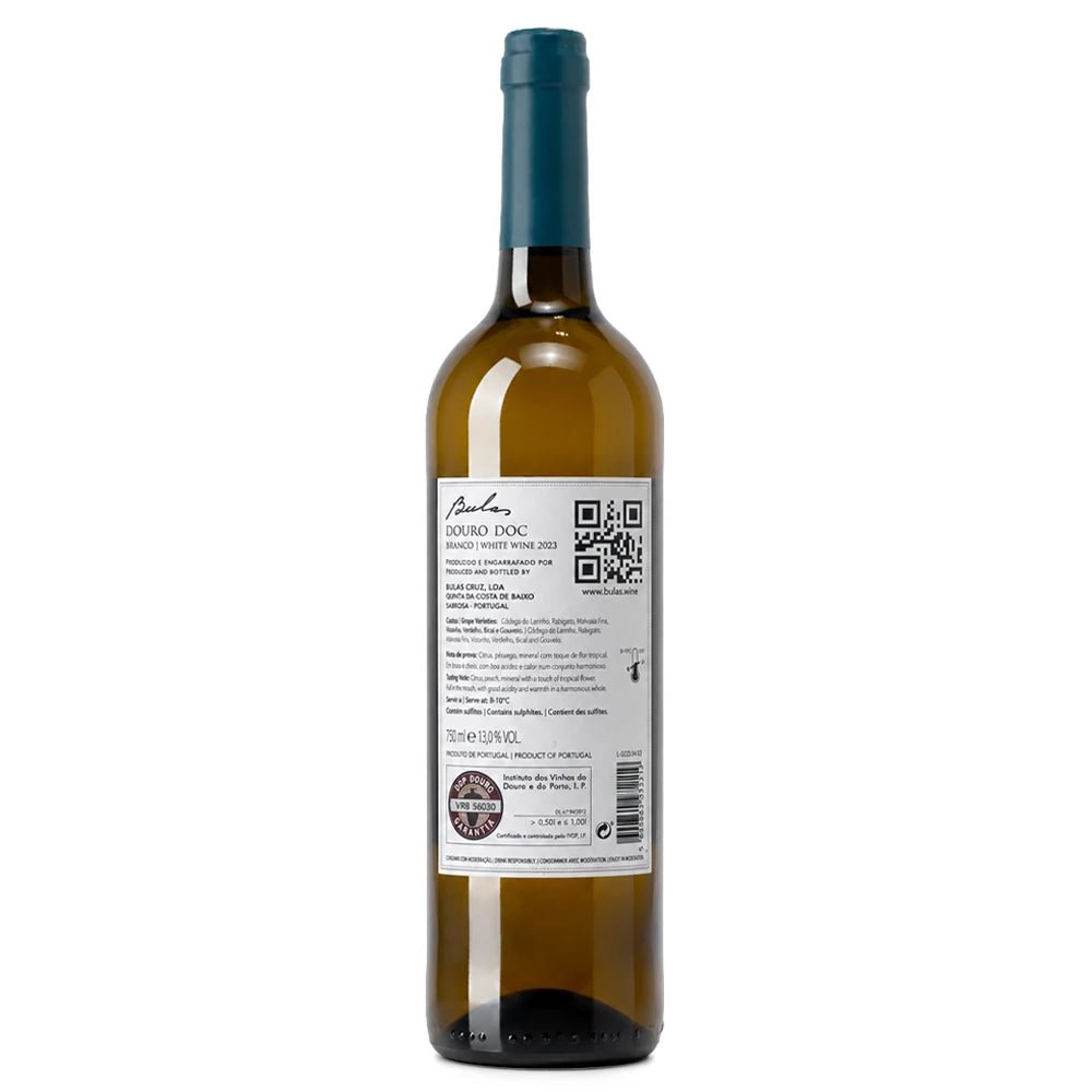 A bottle of Bulas Douro DOC white wine shown from the back, featuring a dark teal cap, a white label with text and a QR code, and a dark green glass base, set against a plain white background.