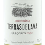 Wine bottle label with 'Terras de Lava' branding and vineyard illustration on a white background