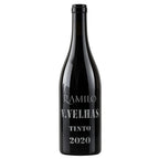 A dark glass wine bottle with a black label featuring white text that reads 'RAMILO V.VELHAS TINTO 2020' on a plain white background.