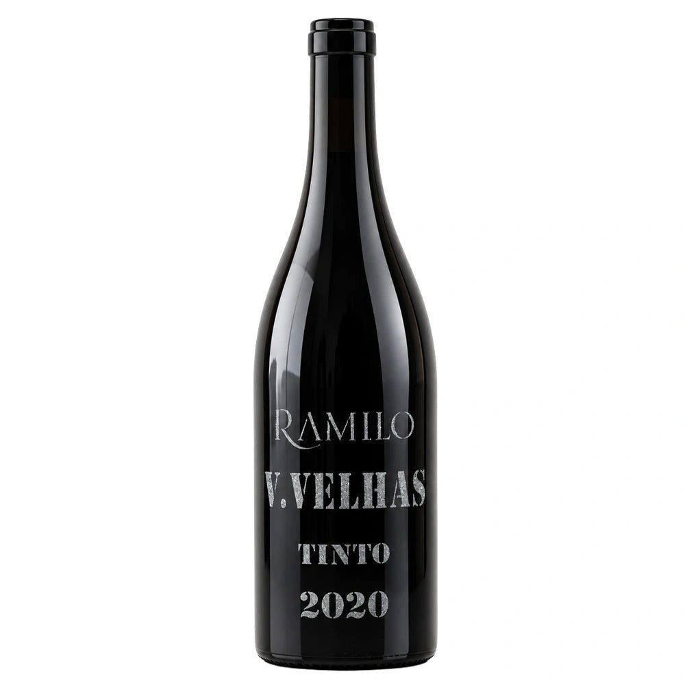 A dark glass wine bottle with a black label featuring white text that reads 'RAMILO V.VELHAS TINTO 2020' on a plain white background.