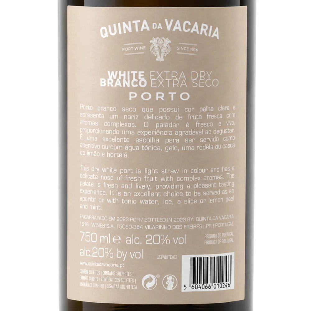 The back of a wine bottle label for Quinta da Vacaria White Branco Extra Dry Seco Porto, showing product details, translations, a barcode, and regulatory text on a dark bottle background.