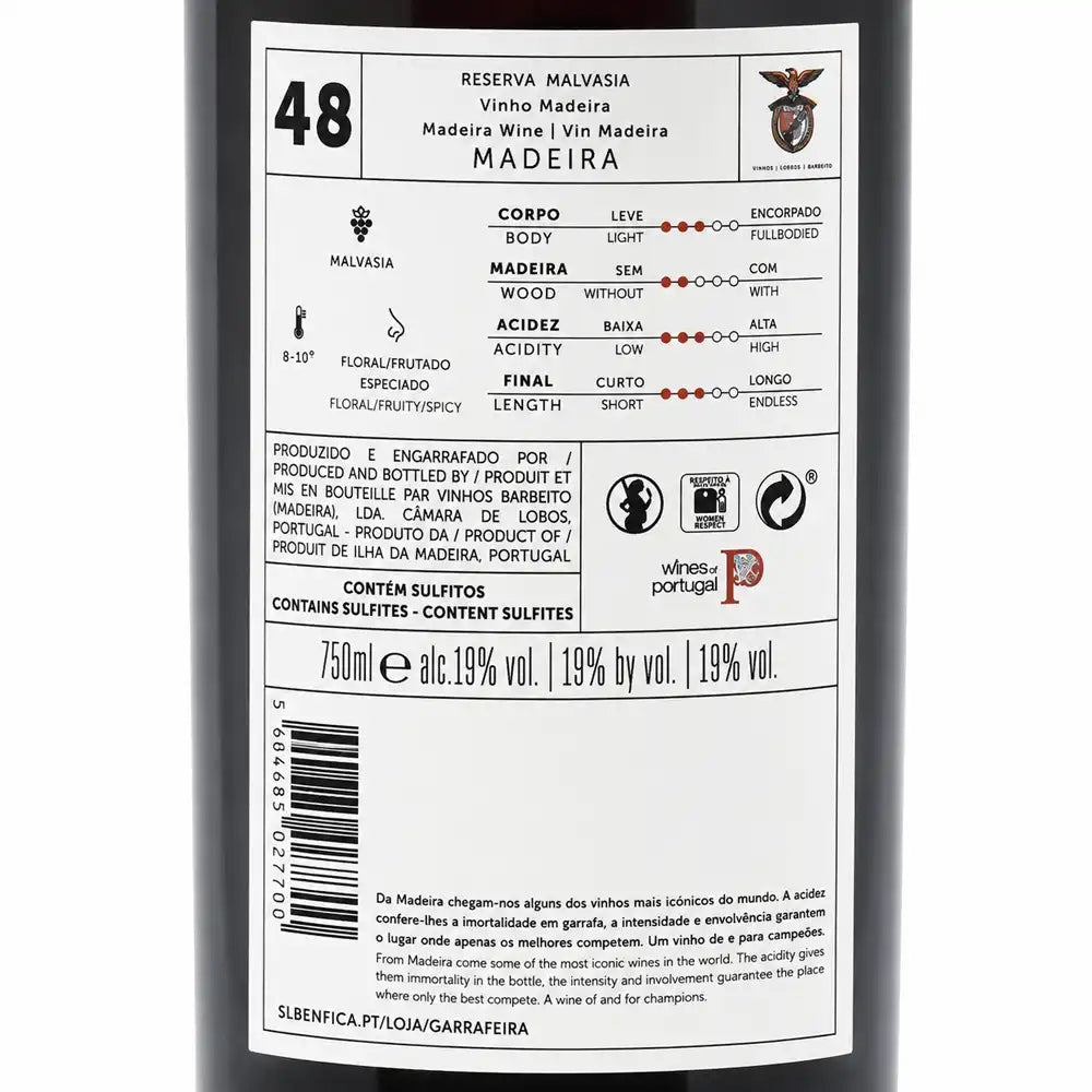 The back of a 750ml wine bottle showing the Portuguese label details for Reserva Malvasia Madeira. The label is white with black text and red accents, displaying wine style characteristics, production info, and a wine glass icon indicating it is a wine product.
