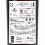 The back of a 750ml wine bottle from Doc Carcavelos, showing Portuguese wine regulations, ingredients, and production details on a white background.