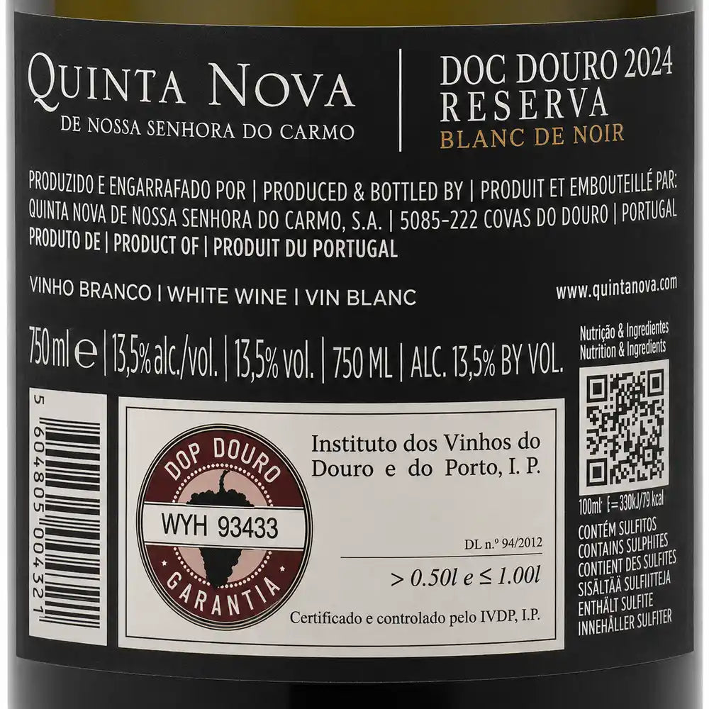 Close-up of the back label of a bottle of Quinta Nova Doc Douro Reserva Blanc de Noir white wine, showing product details, barcode, QR code, and certification marks on a dark background.