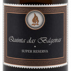 Close-up of a wine bottle label reading 'Quinta das Bageiras' and 'SUPER RESERVA' on a dark background with decorative border details.