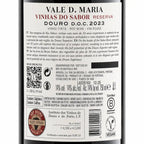 The back of a Vale D. Maria Vinhas do Sabor Reserva Douro 2023 red wine bottle, showing detailed Portuguese product information, ingredients, allergens, and certification logos on a black background.