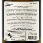 The back of a white wine bottle showing Portuguese product information, including the brand Barbeito, wine details, and a barcode.