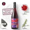 A bottle of Douro Qalt red wine is centered on a white background with decorative illustrated line art and small product-related props around it, including a bowl of raspberries labeled Balanced, a rock labeled Fresh, and a rosemary sprig labeled Linger. A text callout explains that Douro reds can be light despite the 'heavy' Douro name.