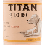 Wine label for 'Titan of Douro' with a dog and cat illustration on a beige background