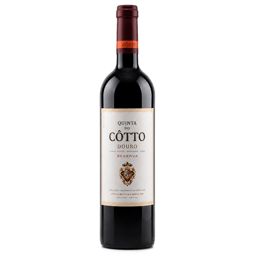 A bottle of Cotto Douro Reserva red wine, featuring a dark glass bottle, a cream-colored label with black text and a gold crest, and a dark red foil capsule at the neck, set against a plain white background.