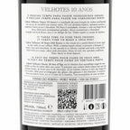 The back of a Portuguese wine bottle label for Velhotes 10 Anos, showing product details, ingredients, barcode, and a QR code on a white background.
