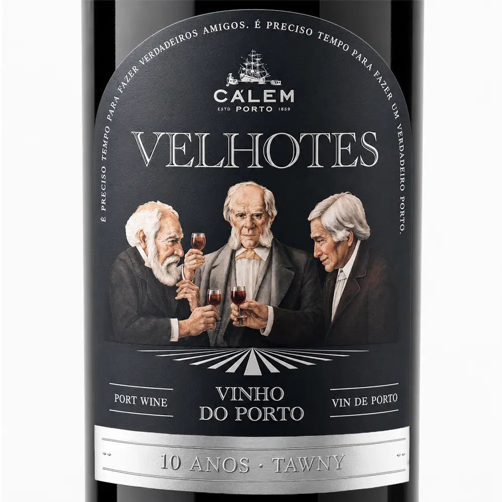 A bottle of Calem Velhotes Port wine with a dark label featuring an illustration of three men clinking wine glasses and the text '10 Anos - Tawny'.