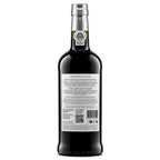 Back view of a bottle of Velhotes 10 Anos Port Wine, showing the detailed product information label and silver foil neck seal on a white background.