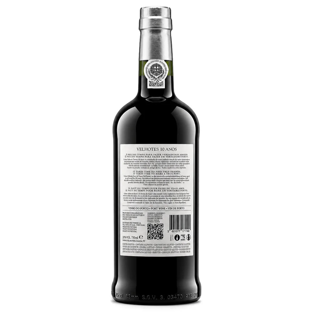 Back view of a bottle of Velhotes 10 Anos Port Wine, showing the detailed product information label and silver foil neck seal on a white background.