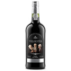 A bottle of Calen Velhotes Vinho do Porto non-alcoholic red wine, featuring a dark glass bottle with a detailed black and silver label and a traditional Portuguese seal on the neck.