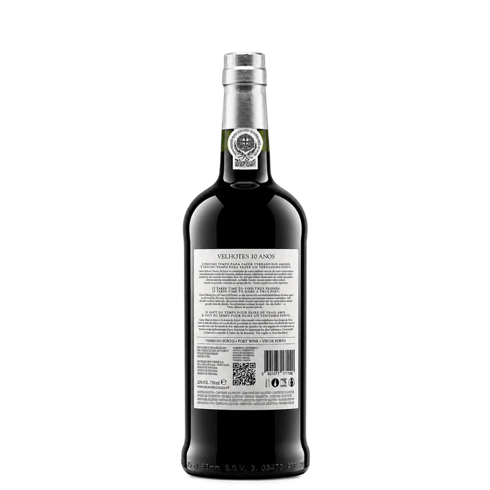 A bottle of Cálem Velhotes 10 years Port wine shown from the back, featuring a dark glass body, a silver foil seal, and a white product information label with text and a barcode.