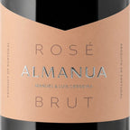 Rose Almanua Brut wine bottle label with peach-colored label and black text.