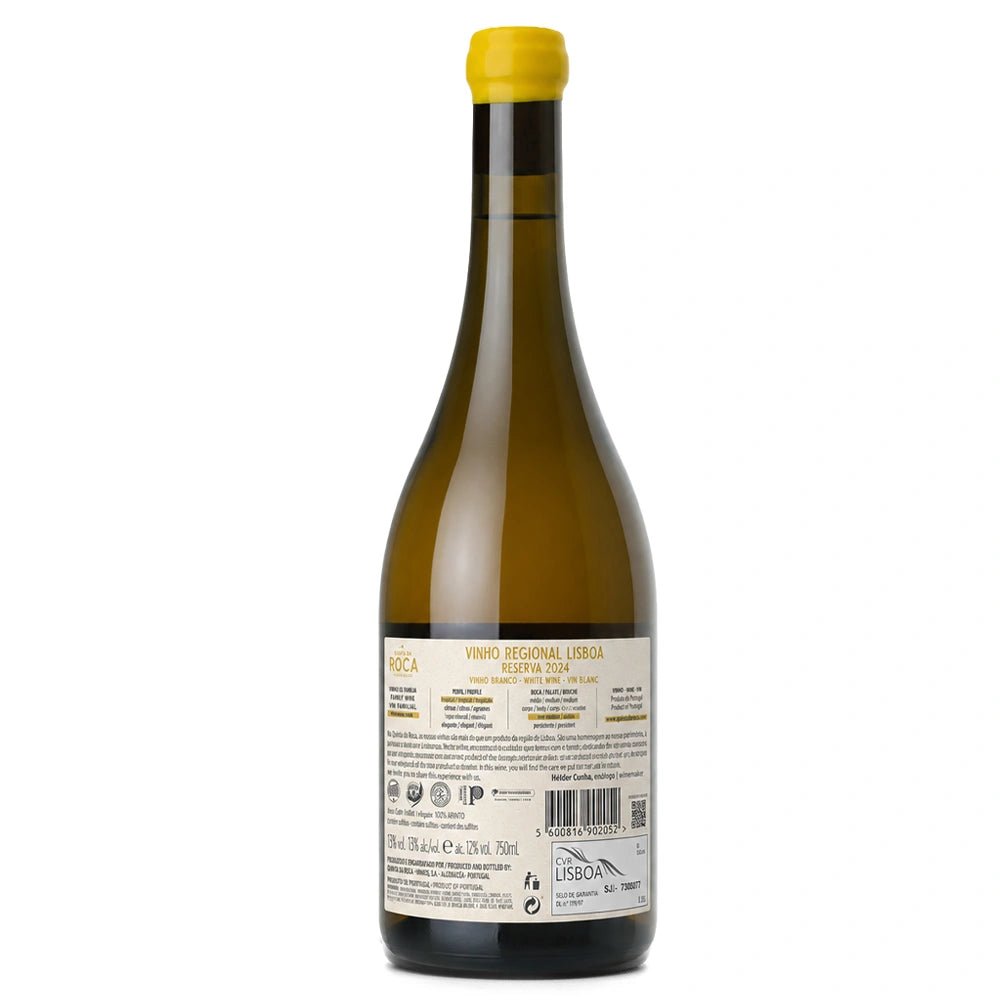 Back view of a glass bottle of white wine with a yellow screw cap and a cream-colored label showing product details and a barcode.
