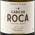 Close-up of a wine label reading 'Cabo da Rocha Coastal Wines' with 'Arinto Reserva' in gold script, on a white label with dark bottle edges visible at the top and bottom.