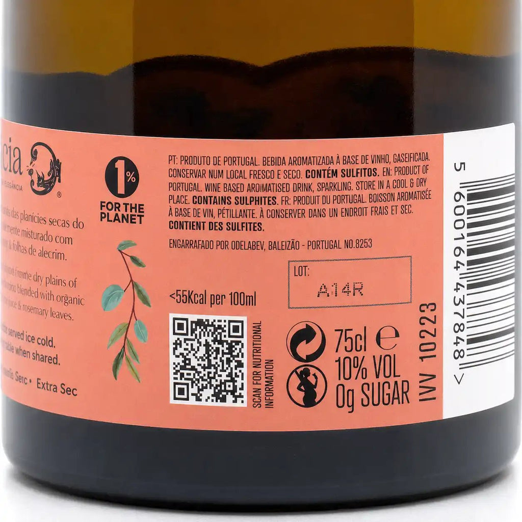 Close-up of a dark bottle label with a peach-pink background, barcode, QR code, nutritional information, and Portuguese text. The bottle itself is dark brown/black glass with a yellowish olive oil visible at the top.