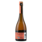Back view of a glass bottle with an amber-brown body, a peach-colored neck label, and a cork closure, shown on a plain white background.