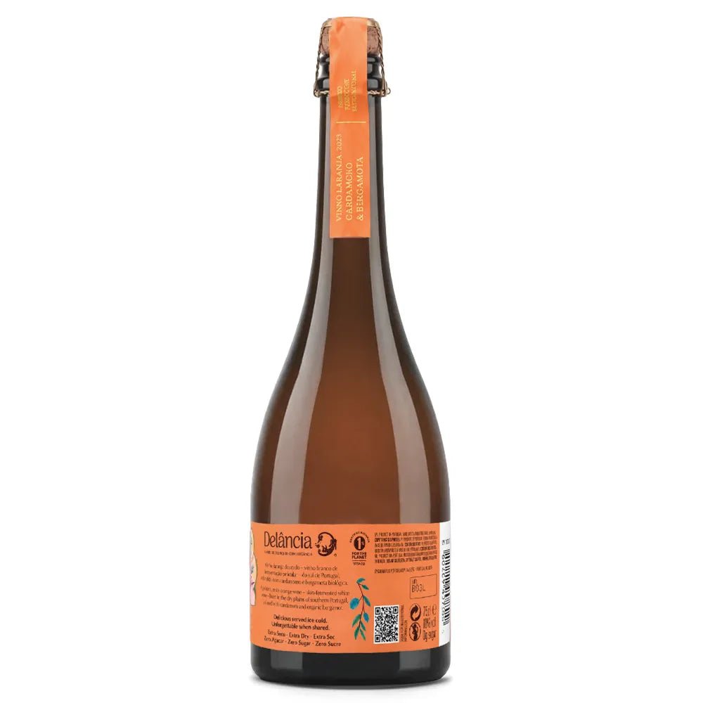 A bottle of Delância Orange with a vibrant, multicolored floral label and an orange neck foil, shown on a solid white background.
