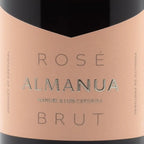 Rose Almanua Brut wine bottle label with pink and black design
