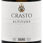 Close-up of a wine bottle label reading CRASTO ALTITUDE 430 DOC DOURO 2022, with a white label, black text, and a small multicolor crest at the top.