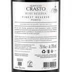 The back of a Quinta do Crasto Ruby Reserva Port wine bottle, showing the Portuguese and English label text, volume of 750ml, alcohol content 12% vol, and a vegan logo.