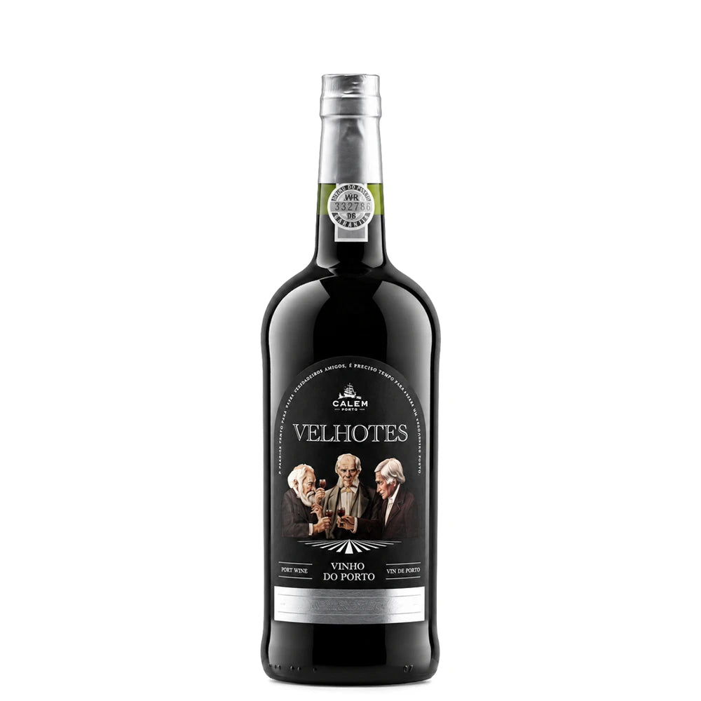A bottle of Calem Velhotes Vinho do Porto non-alcoholic red wine, featuring a black glass bottle, silver foil neck seal, and a black label with white text and portraits of elderly men.