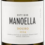 Close-up of a white wine label reading MANOELLA DOURO 2024, with black and gold typography on a clean white background.